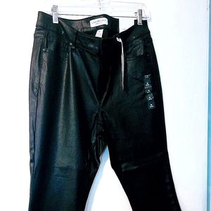 Lane Bryant Jean's size 16 petite black matte. Ruffle at the bottom. Never worn.